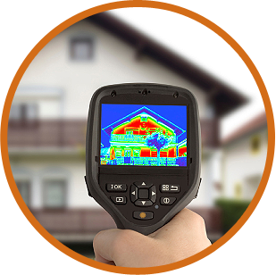 mister-green-jeans-energy-audits-img A hand holding an infrared thermal camera displaying a heat map of a house, highlighting temperature variations on the building's exterior—perfect for an insulation company Baton Rouge to assess and improve energy efficiency.