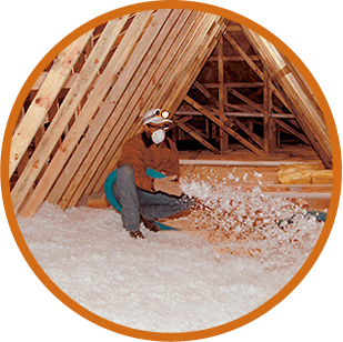 mister-green-jeans-residential-insulation-img A person wearing safety gear insulates an attic space with loose-fill insulation, showcasing the expertise of an insulation contractor. For top-quality services in New Orleans, consider reaching out to a trusted insulation company.